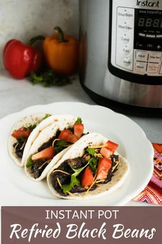 This Instant Pot Refried Black Beans recipe is so easy to make! Spiced with Jamaican Jerk BBQ seasoning, onion and garlic power and cilantro, these are not your typical refried black beans! Treat your tastebuds to a tangy and savory kick of flavor! #refriedblackbeans #InstantPot #blackbeans #refriedbeans #easyinstantpotrecipes #pressurecookerrecipes