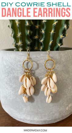 DIY Dangle Cowrie Shell Earrings, cowrie shell jewelry, diy earrings, shell earrings, how to make shell earrings, cowrie jewelry, dangle earrings, drop earrings, gold shell earrings, cowrie shell hoop earrings #cowrie #cowrieshell #jewelry #earrings #diyjewelry #shell #shellearings #diyfashion #fashion
