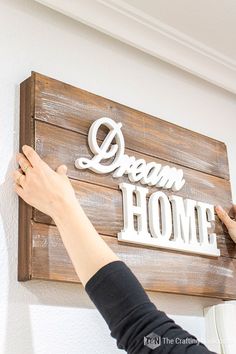 Got those ugly breaker boxes in plain sight? UGH I do, right there in my entryway and I don't like it one bit. This Rustic Wooden Sign Fusebox Cover is pretty, is easy to make and will fix that problem forever!