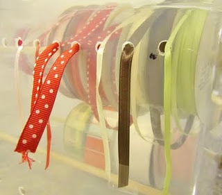 Use glue gun tip to melt holes in a plastic bin. Genius.