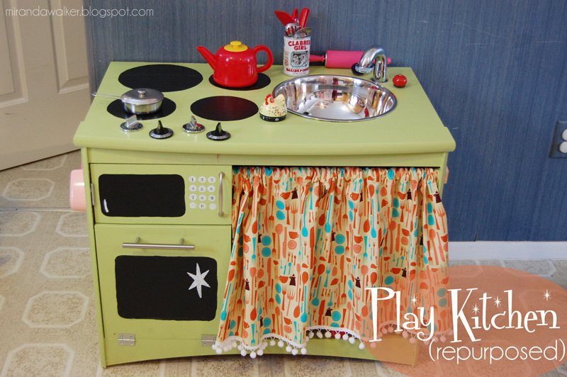 Recycled entertainment center play kitchen